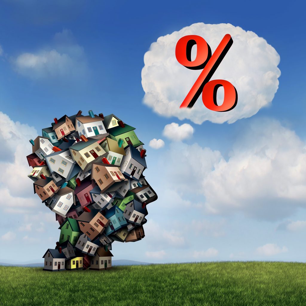 Mortgage rate plan and planning for home lending interest percentage rates as a group of houses shaped as a human head with a percent icon inside a thought bubble as a real estate finance metaphor with 3D illustration elements.